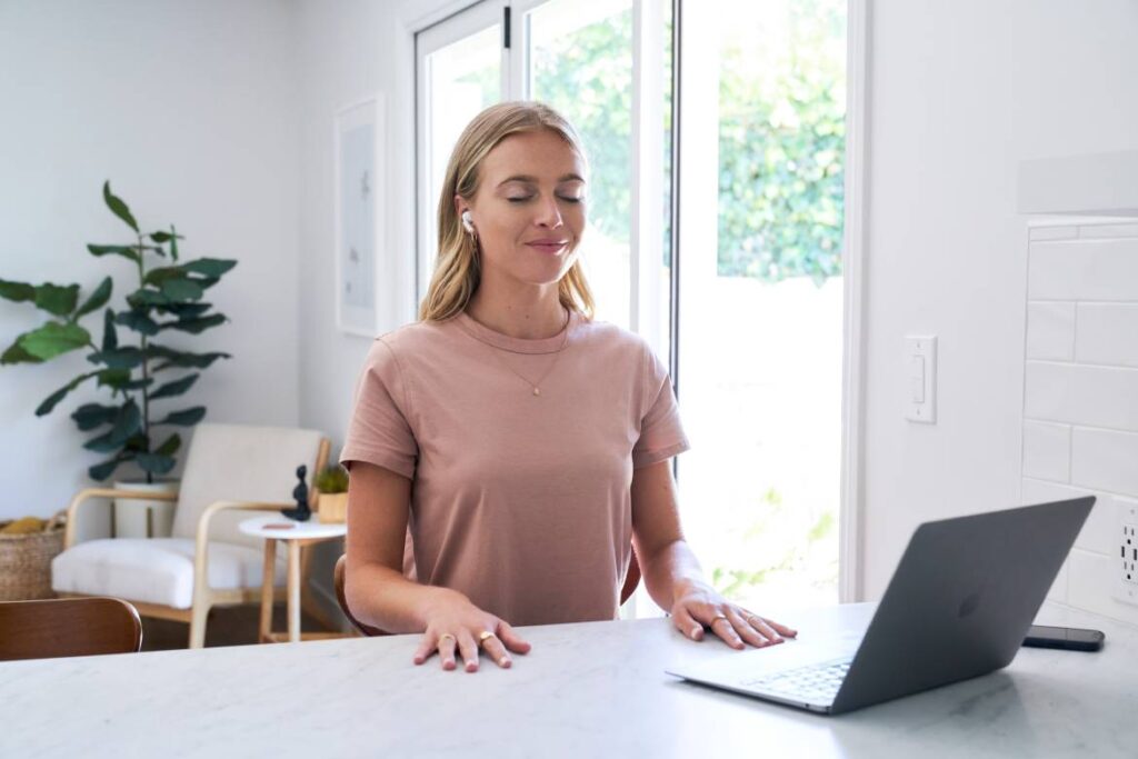 meditating in front of computer