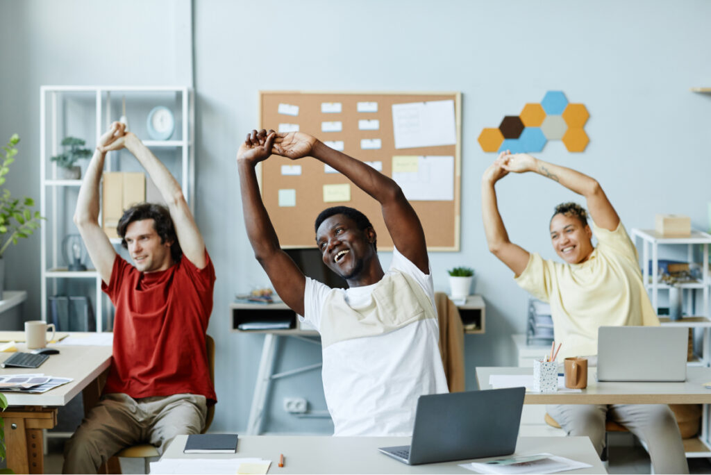 diverse-group-smiling-young-people-doing-stretching-exercises